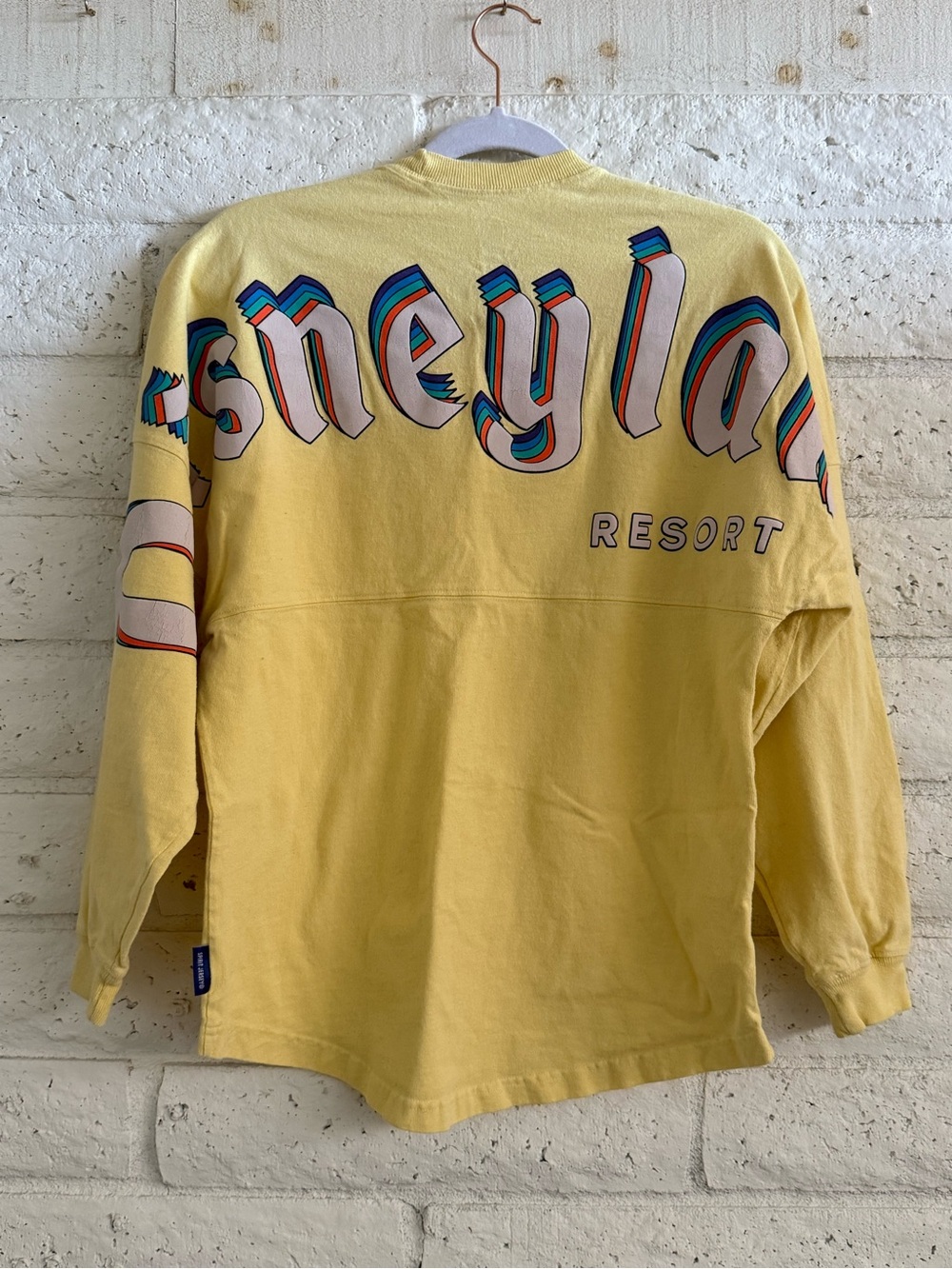 Disneyland Yellow Resort Graphic Shirt with Multicolor Logo